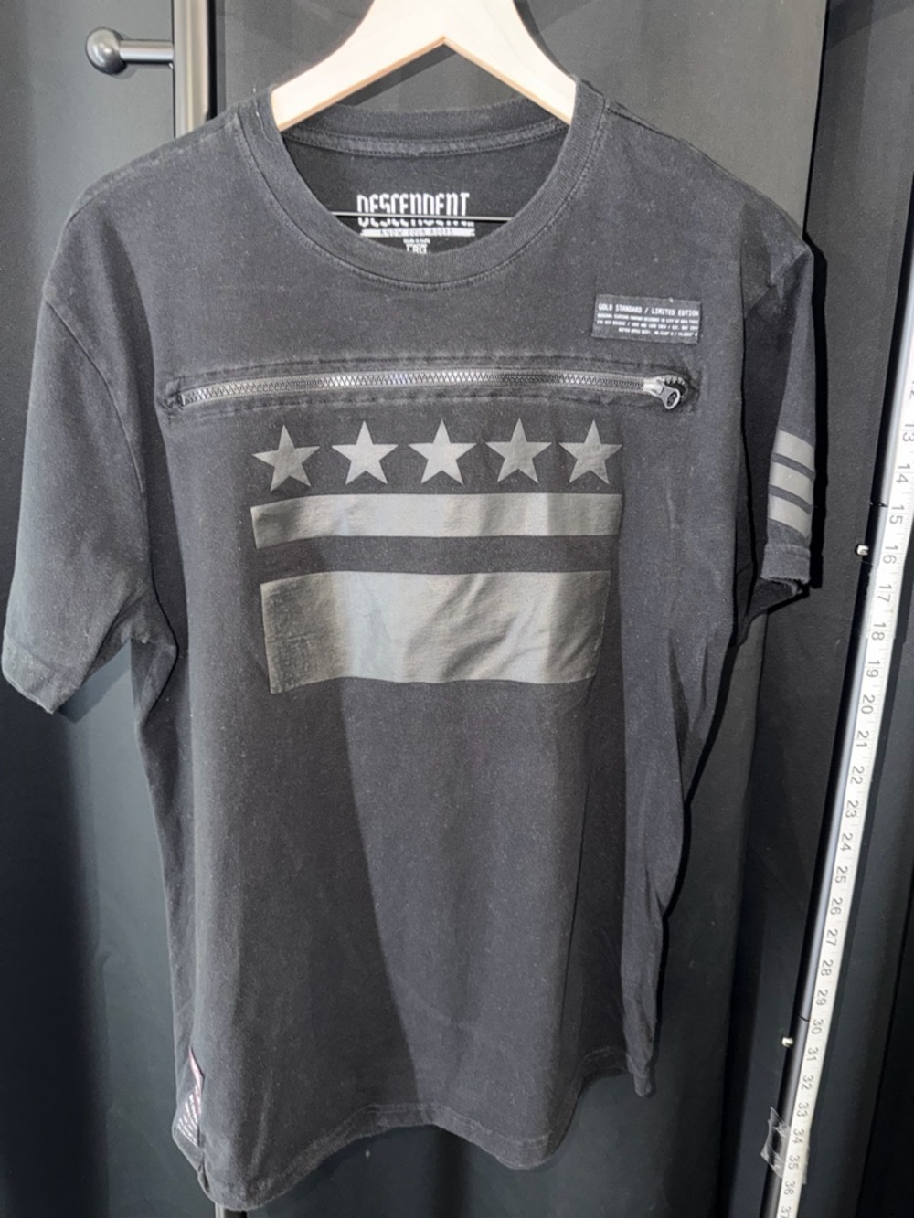 Vintage Descendent Men's Black Short-Sleeve Graphic Tee with Zip Pocket